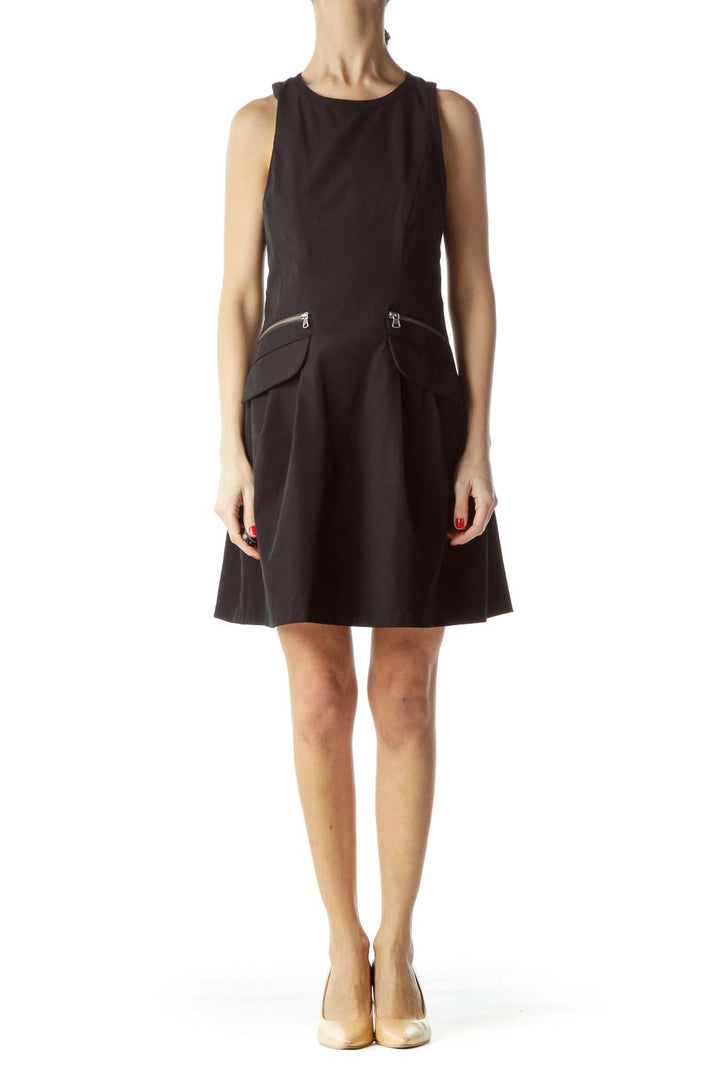 Front view of black sleeveless A-line dress by Nanette Lepore with zipper pocket details