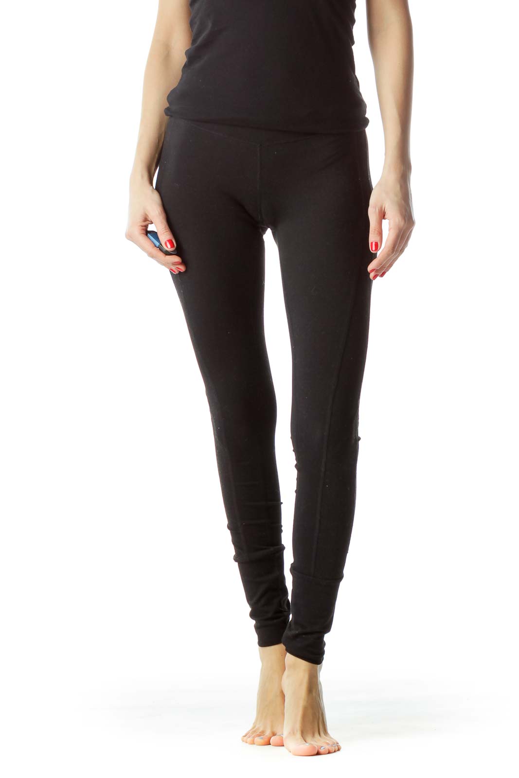 Front view of Zella black high-waisted yoga leggings on model