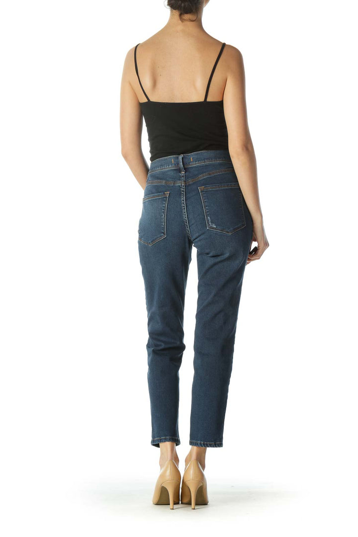 Back view of Free People blue straight leg jeans on model