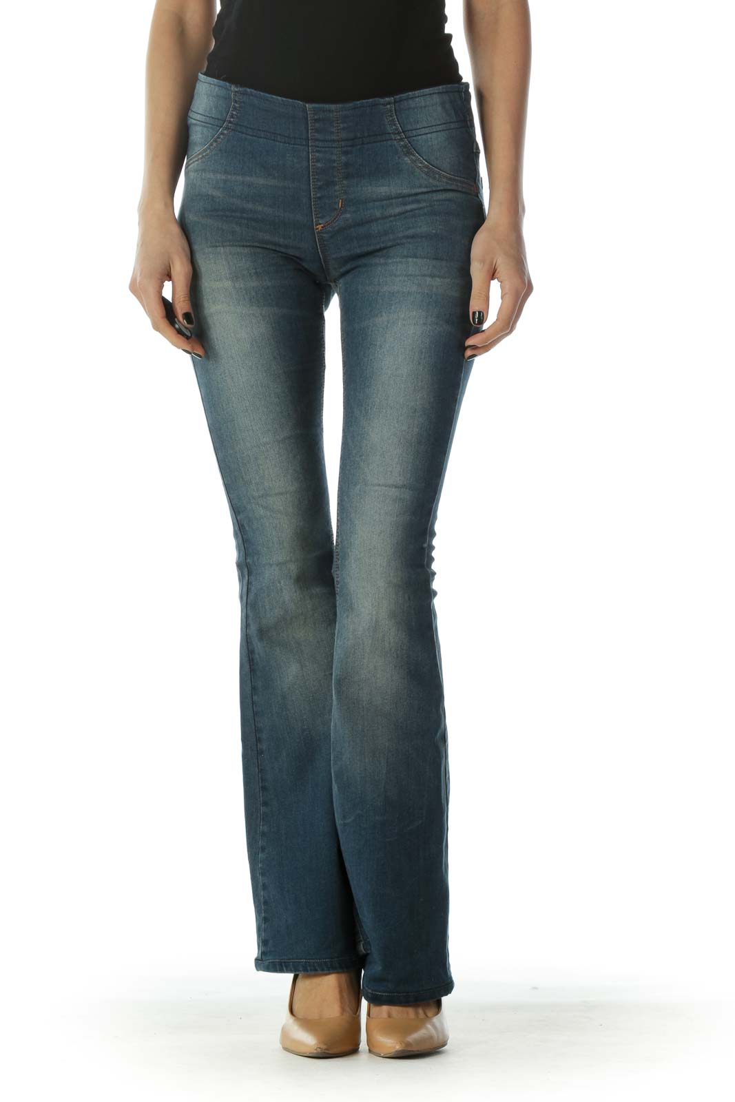 Front view of Free People blue flared denim jeans on model