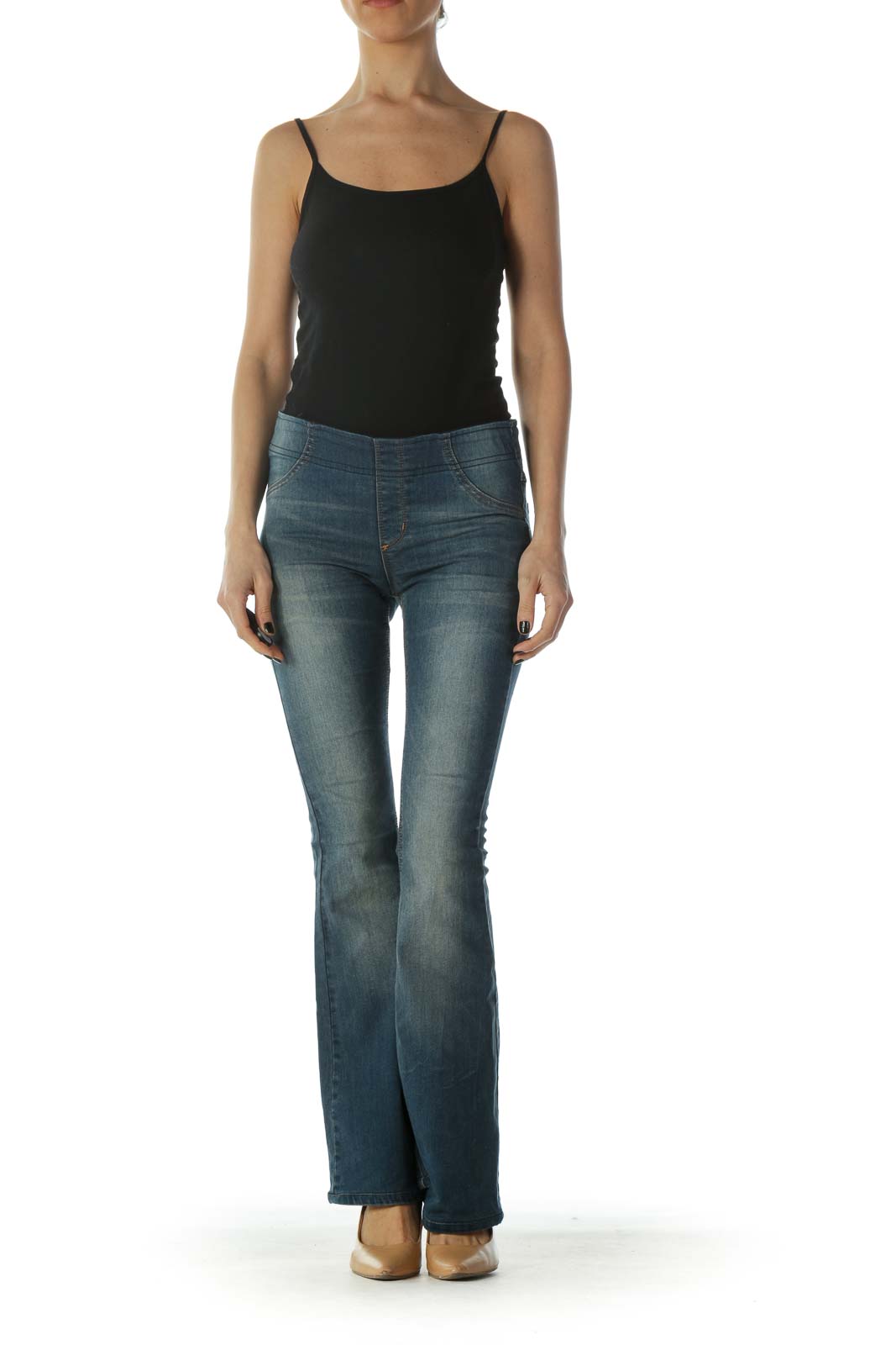 Front view of Free People blue flared denim jeans on model