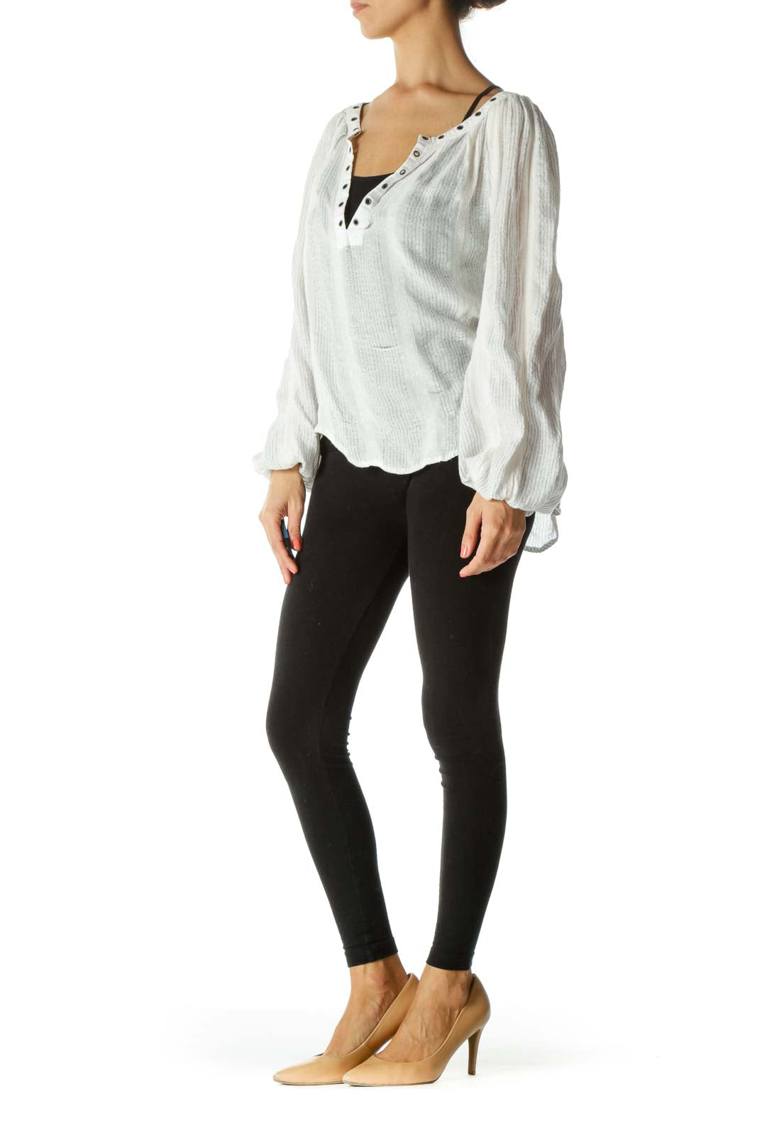 Front view of white Free People blouse with billowing sleeves and stud-detailed V-neckline