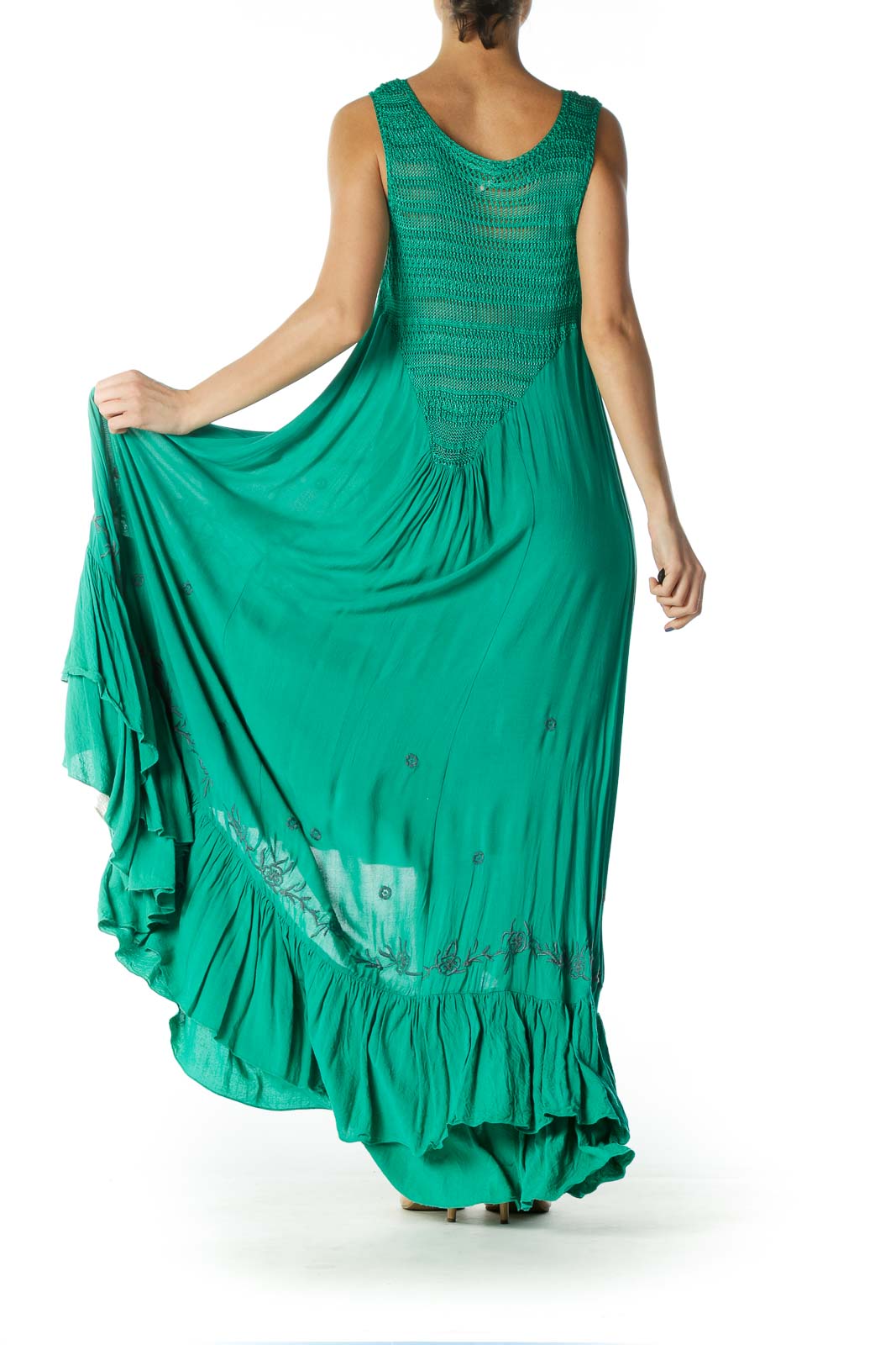 Back view of green Free People maxi dress showing tiered ruffle details