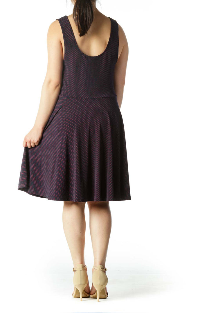 Back view of purple polka dot sleeveless skater dress from Free People