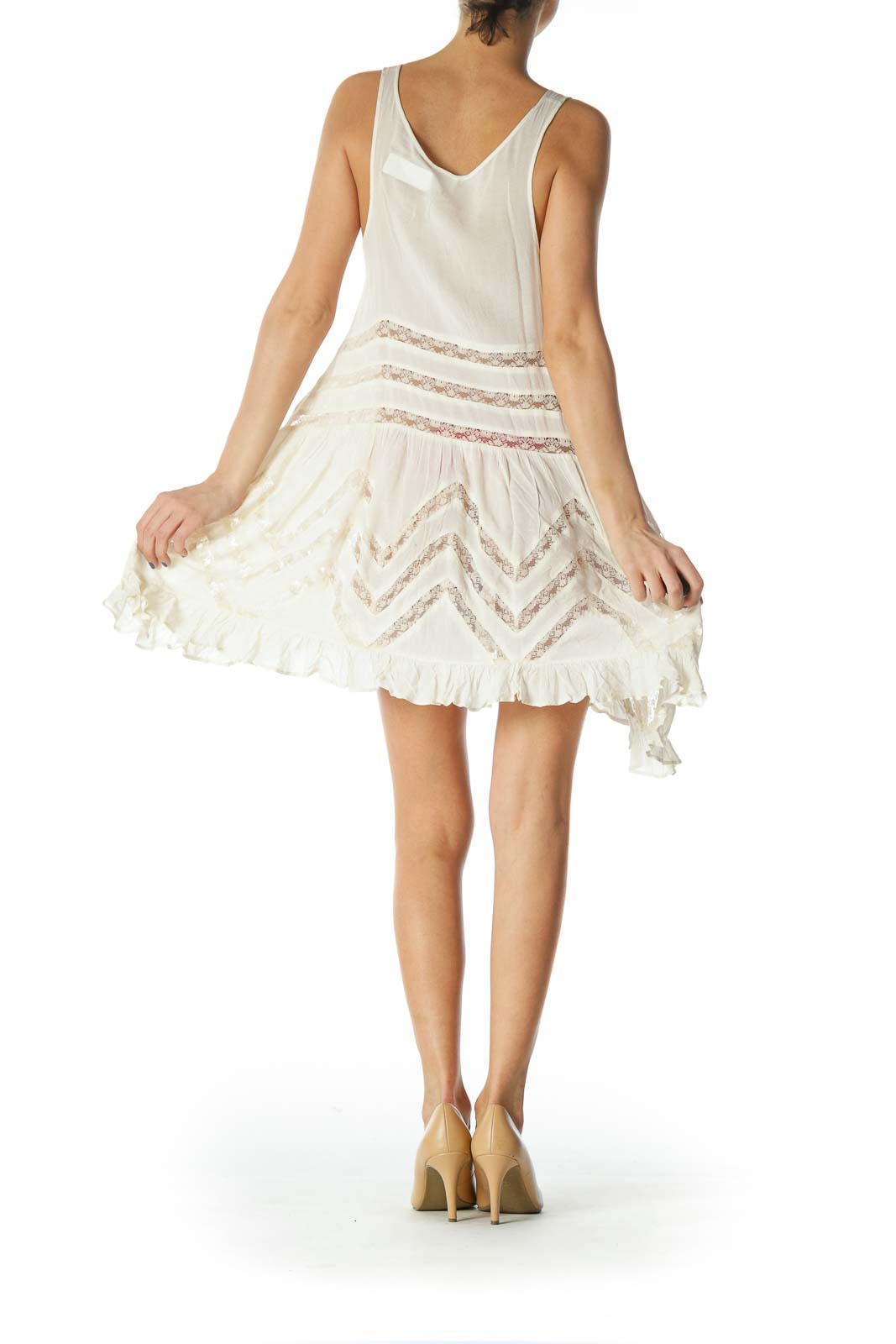 Back view of Free People ivory lace-trimmed flowy tank dress showing racerback design