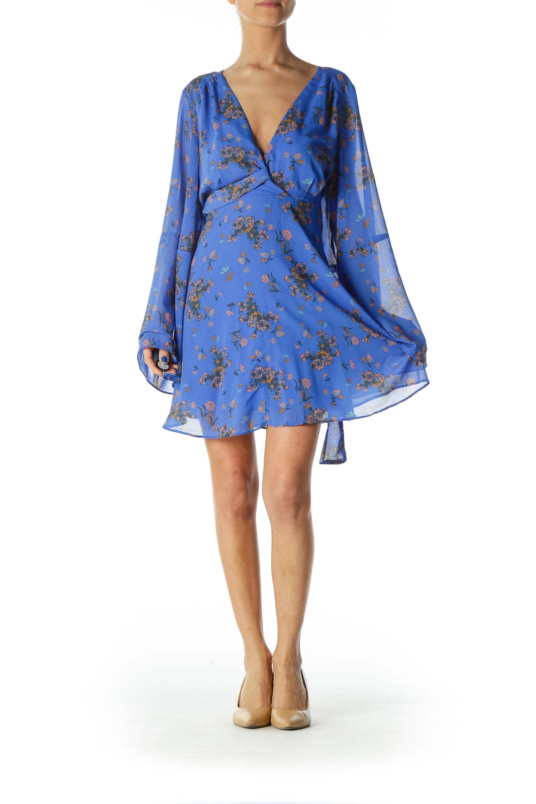 Front view of Free People blue floral long sleeve mini dress with V-neckline