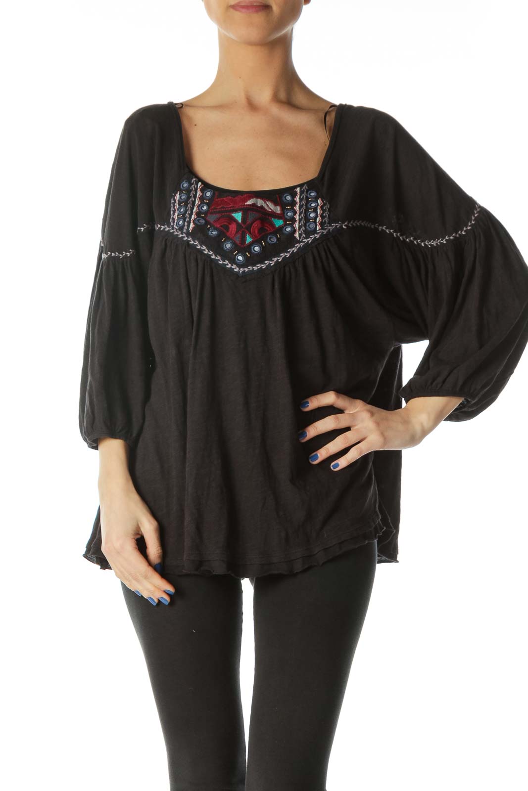 Front view of Free People black peasant top with colorful embroidery and flowy sleeves