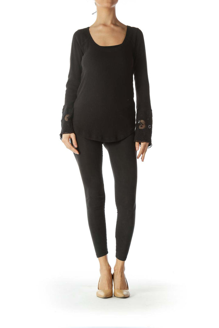 Front view of black Free People long sleeve top with scoop neckline