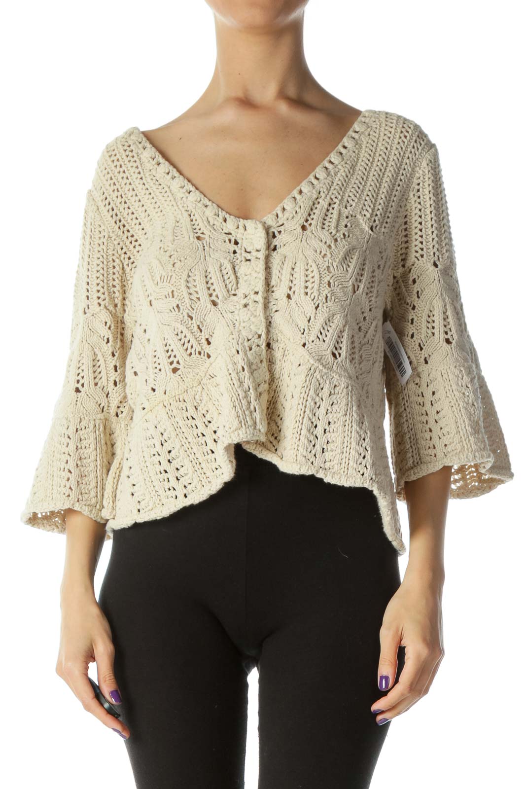 Front view of Free People cream crochet knit cropped cardigan with floral pattern