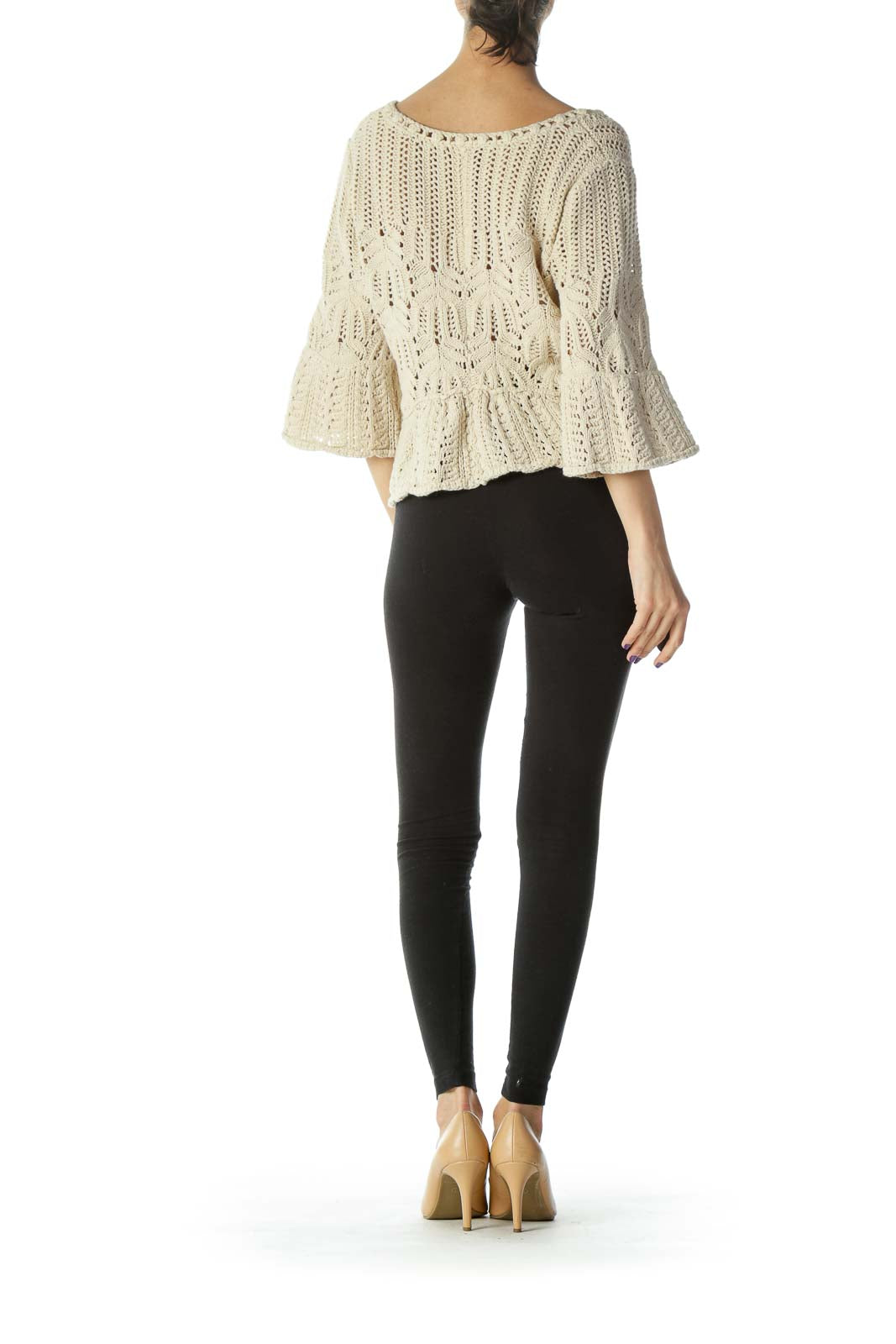 Back view of Free People cream crochet knit cropped cardigan showing flared sleeves