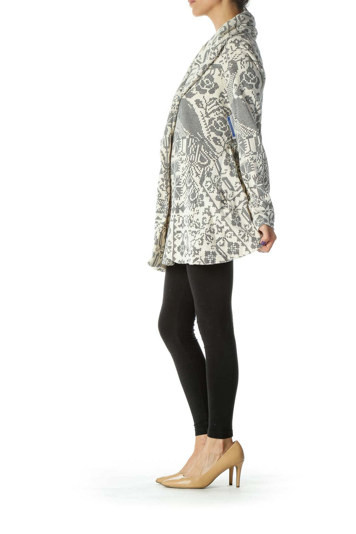 Front view of Free People gray and white patterned knit cardigan on model