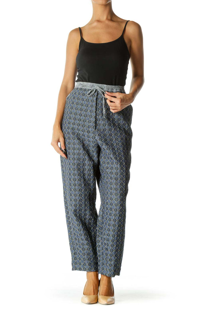 Front view of Free People blue patterned wide-leg pants with drawstring waist