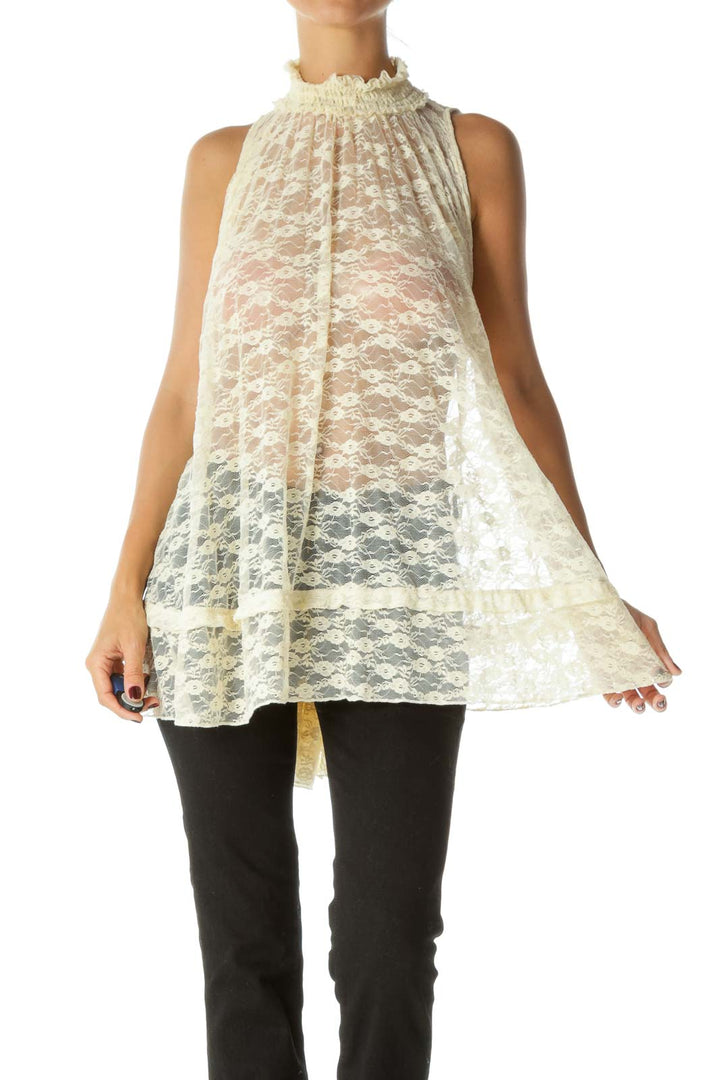 Front view of Free People ivory lace high-neck sleeveless tunic