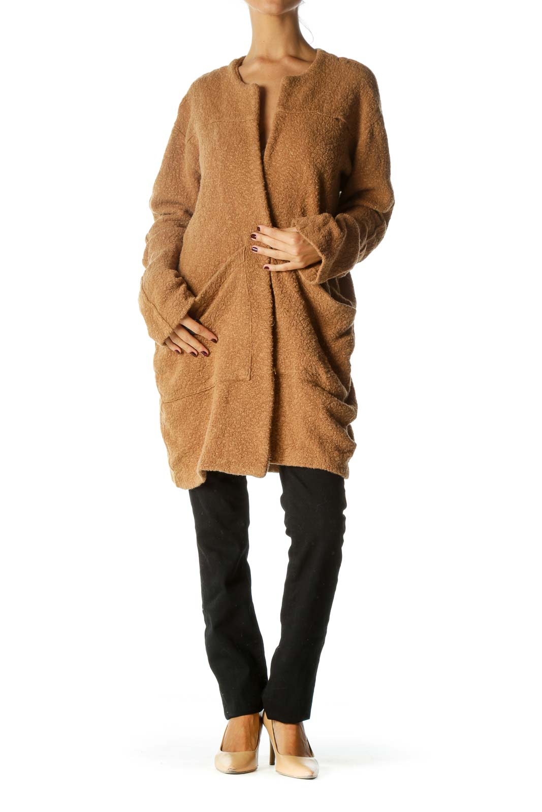 Front view of camel oversized knit cardigan from Free People