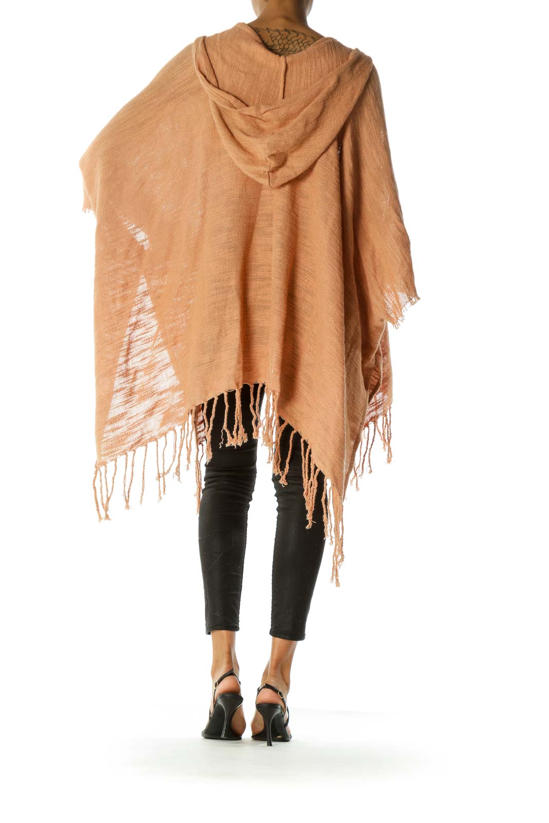 Back view of peach Free People fringed hooded poncho showing hood and fringe details