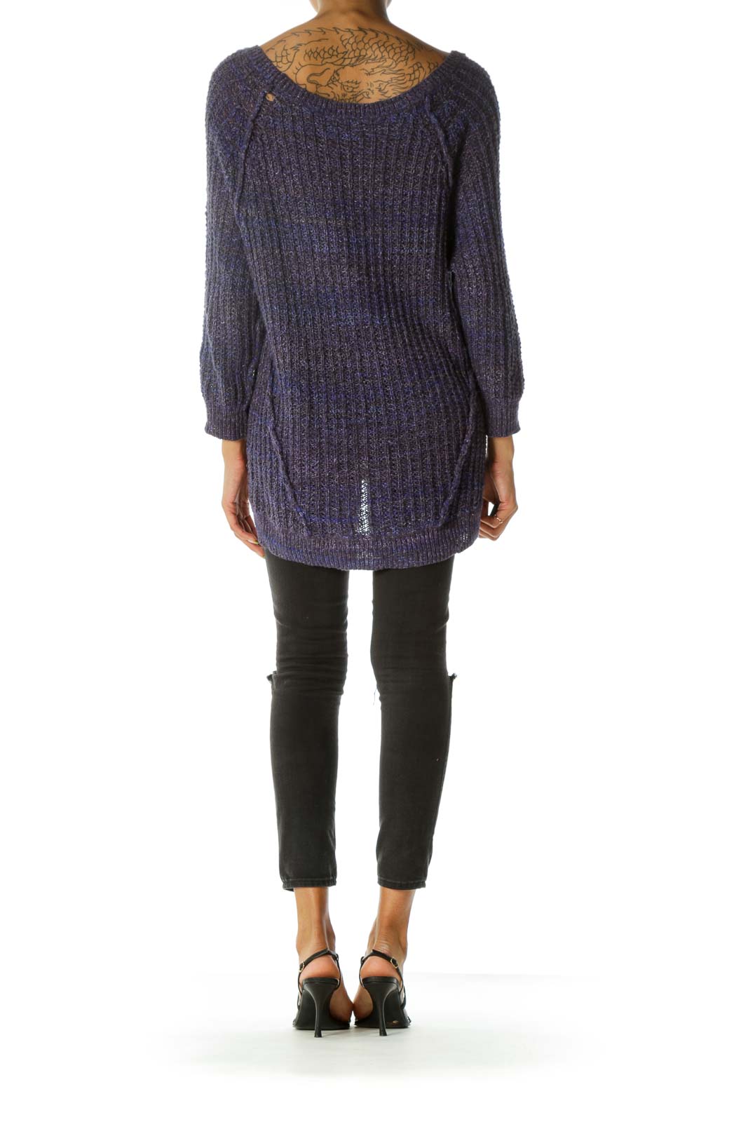 Back view of purple ribbed oversized knit sweater from Free People showing asymmetrical hem