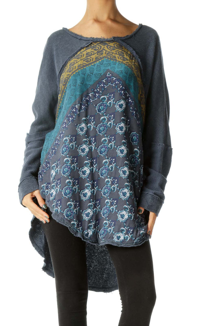 Front view of Free People blue patterned oversized knit sweater with patchwork design