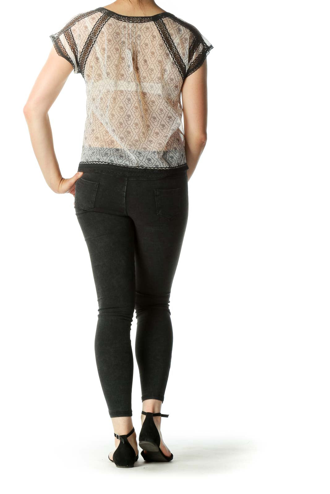 Back view of Free People beige lace crop top showing sheer lace pattern