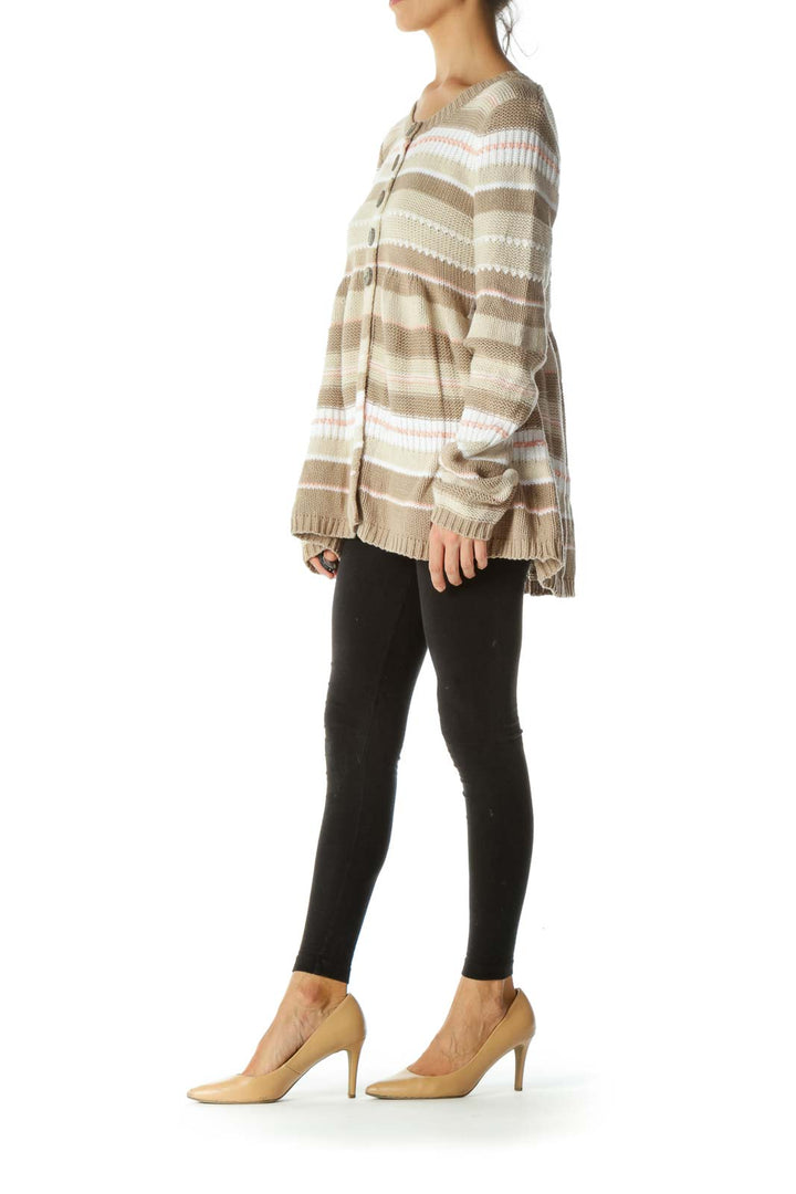 Front view of beige striped Free People cardigan with button-up front