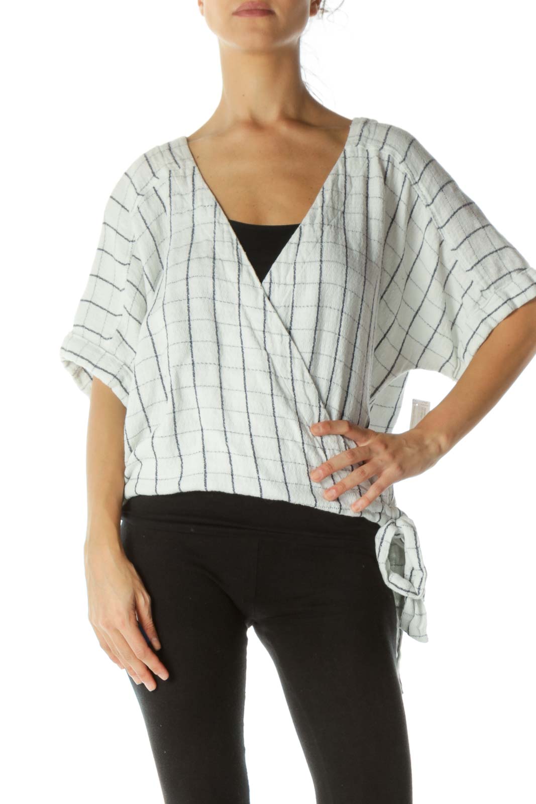 Front view of Free People white striped wrap top with V-neck and tie waist