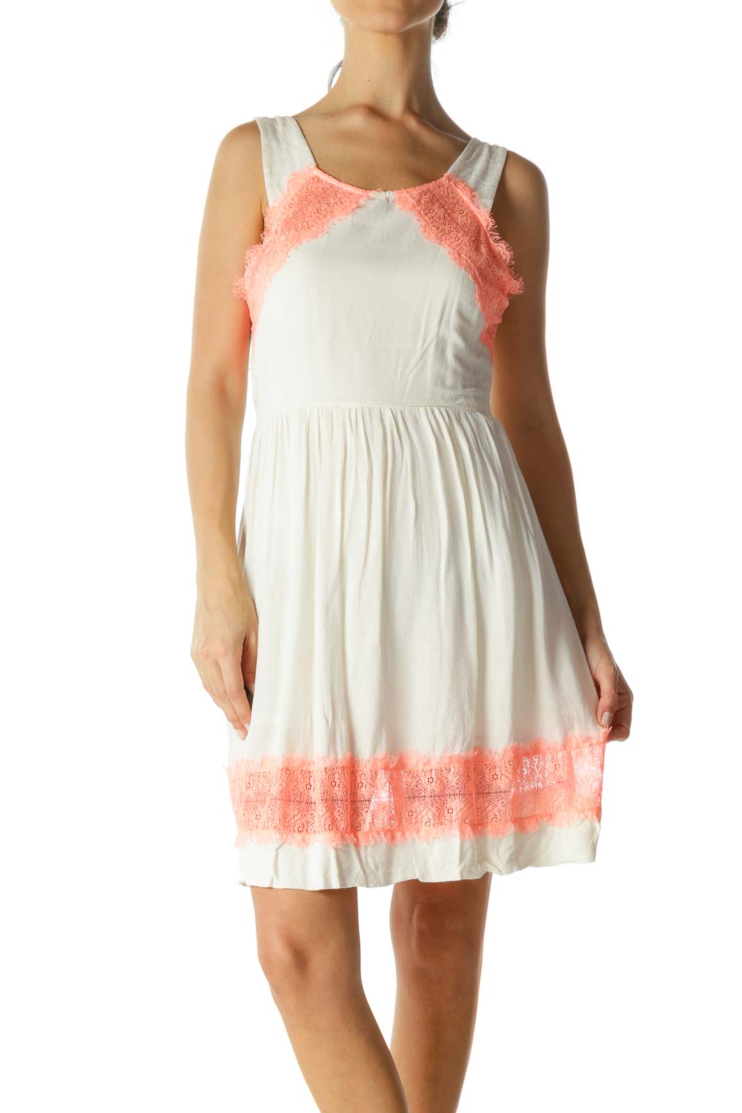 Front view of white Free People sundress with coral lace trim