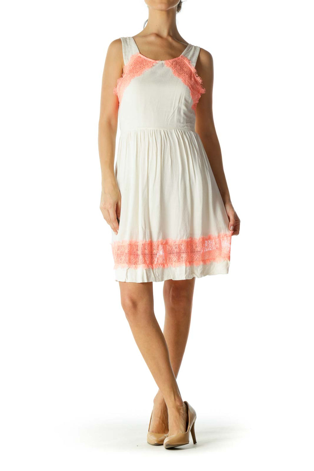 Front view of white Free People sundress with coral lace trim