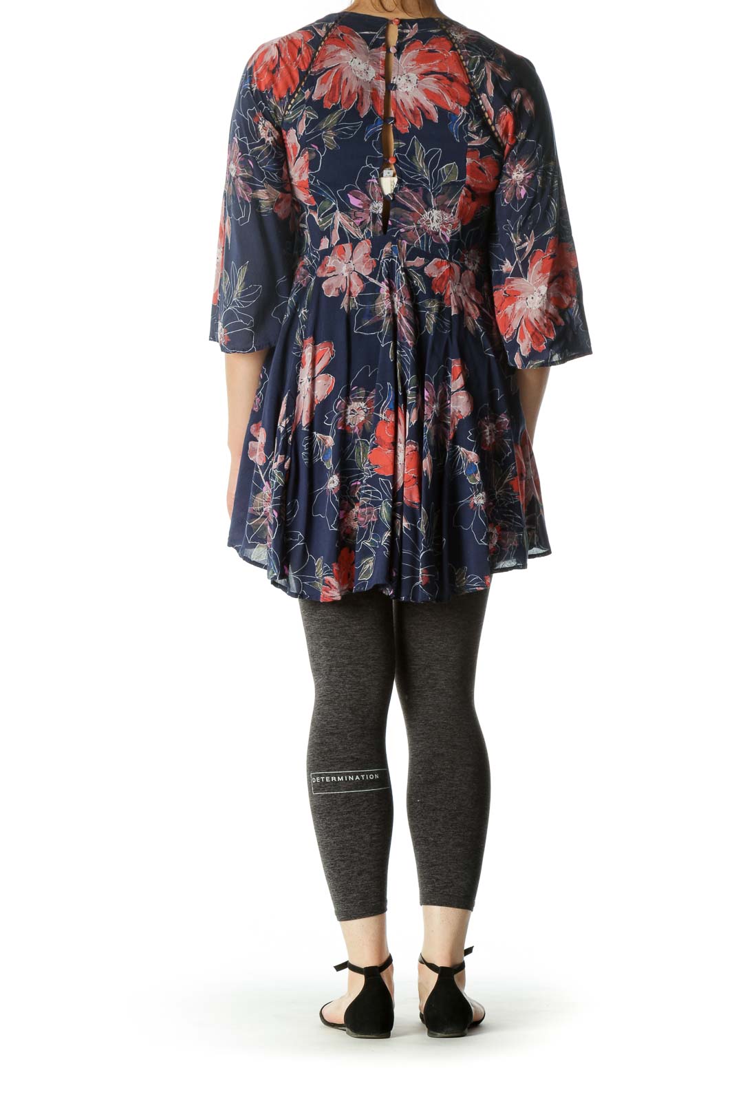 Back view of Free People navy floral tunic dress showing high-low hemline