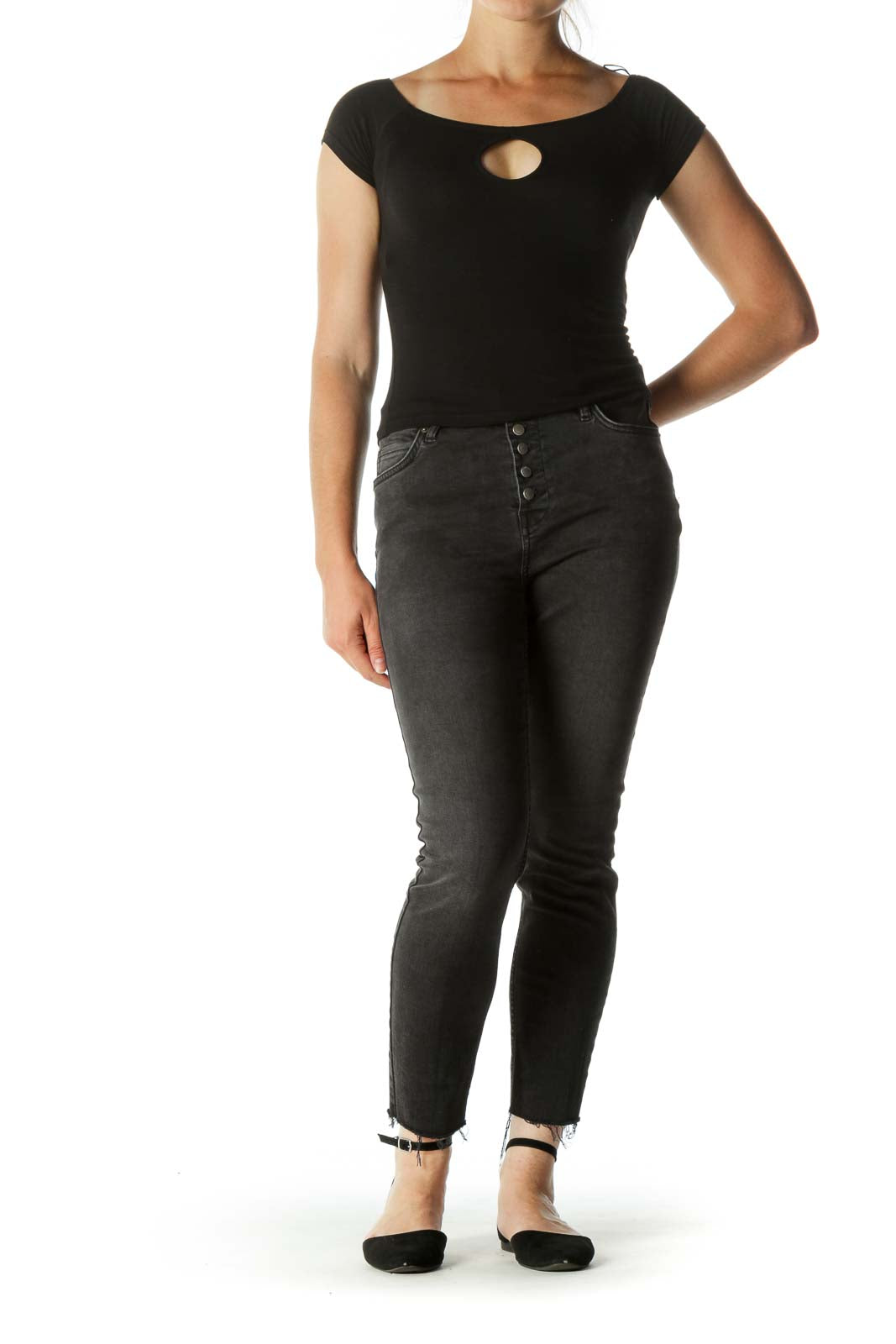 Front view of Free People black distressed skinny jeans with button-fly closure