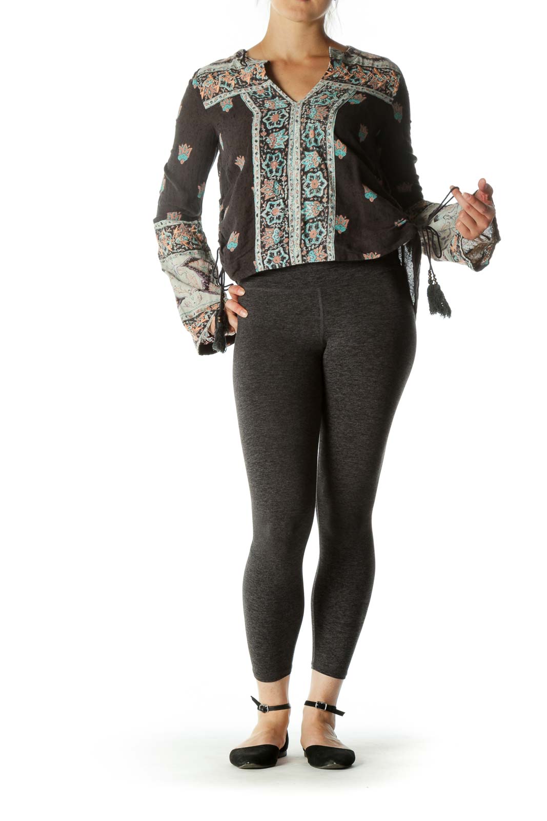 Front view of Free People gray floral top with embroidered V-neck and bell sleeves