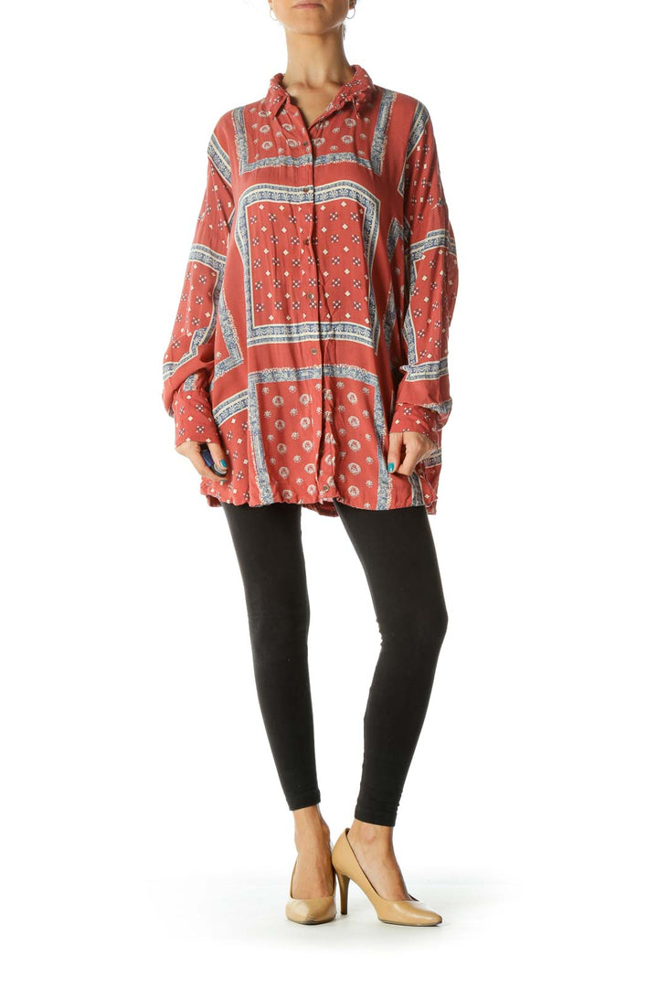 Front view of coral patterned oversized button-down shirt from Free People