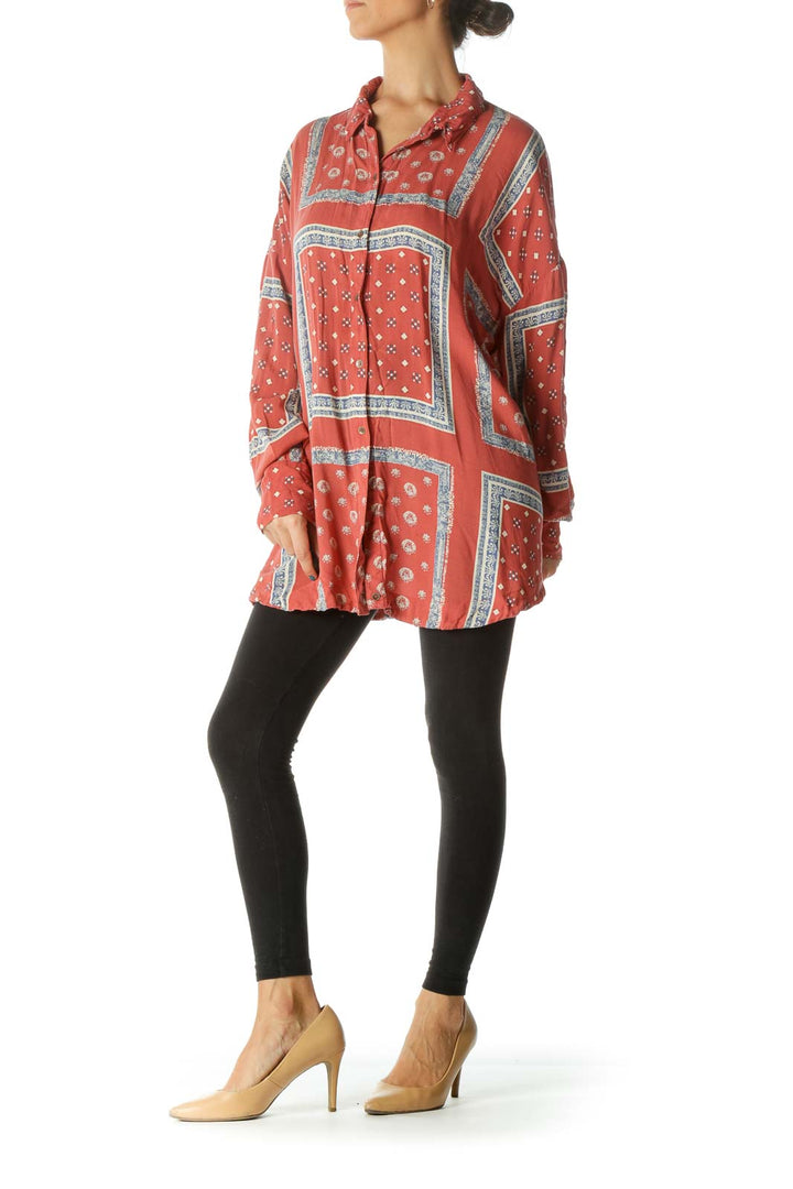 Front view of coral patterned oversized button-down shirt from Free People