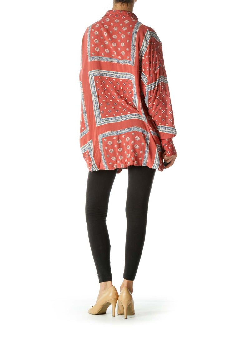 Back view of coral patterned oversized button-down shirt from Free People