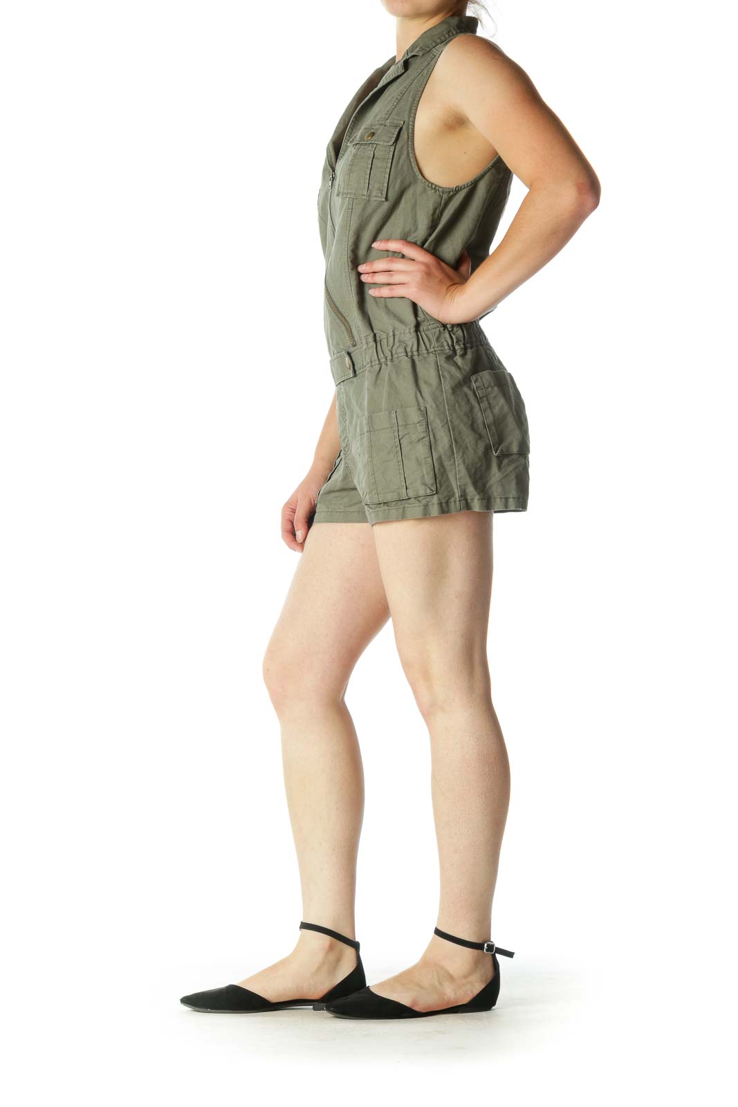 Front view of olive green sleeveless utility romper from Free People