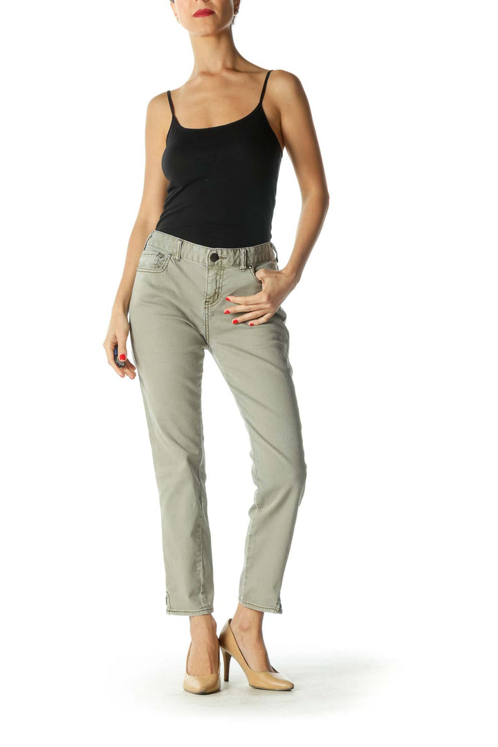 Front view of sage green relaxed fit ankle jeans from Free People