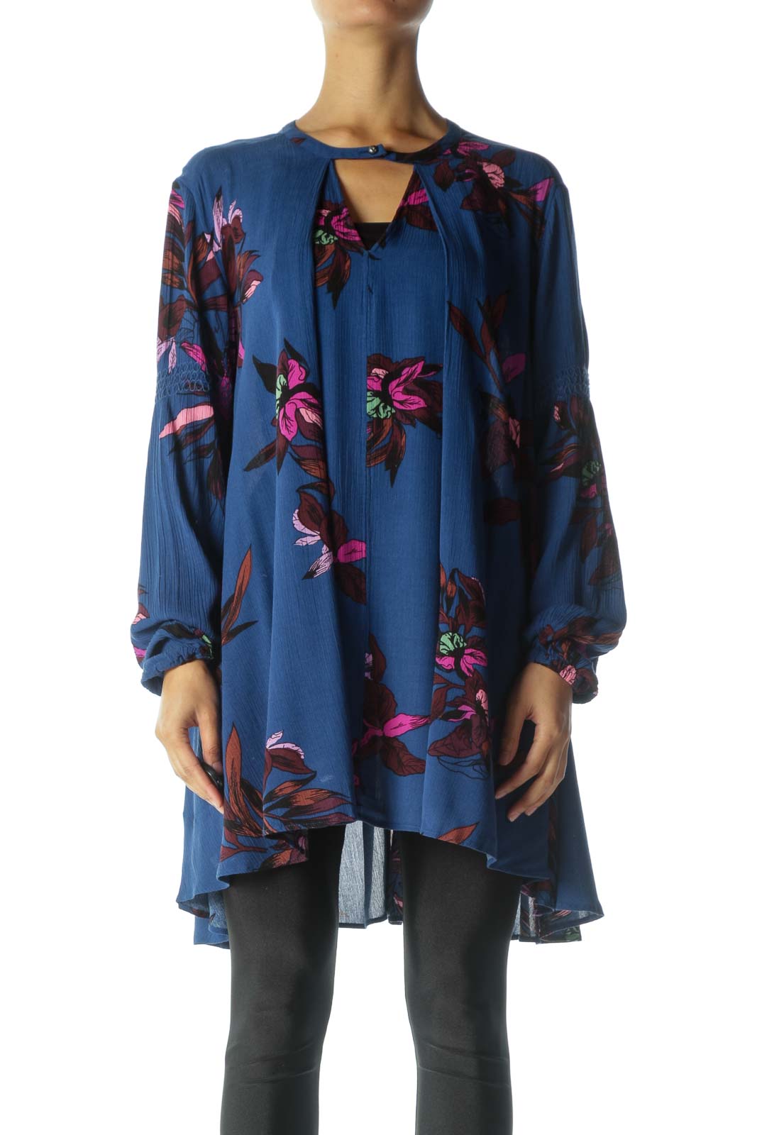 Front view of Free People blue floral tunic top with V-neckline