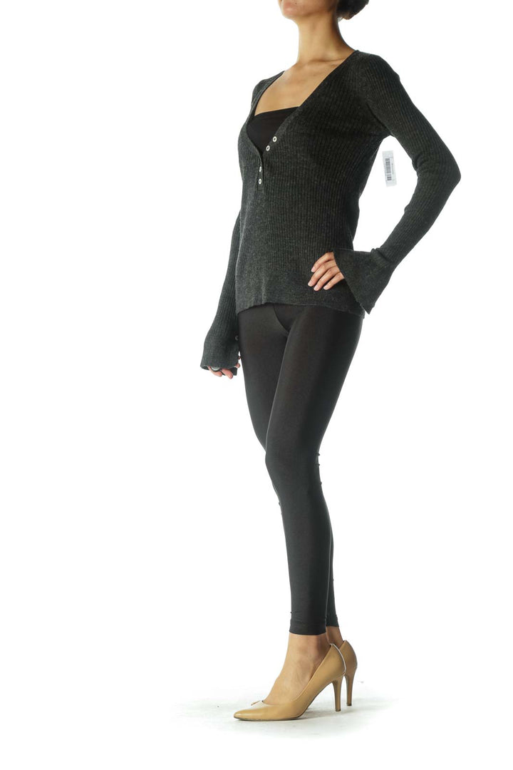 Front view of Free People charcoal ribbed henley top with V-neckline and button details