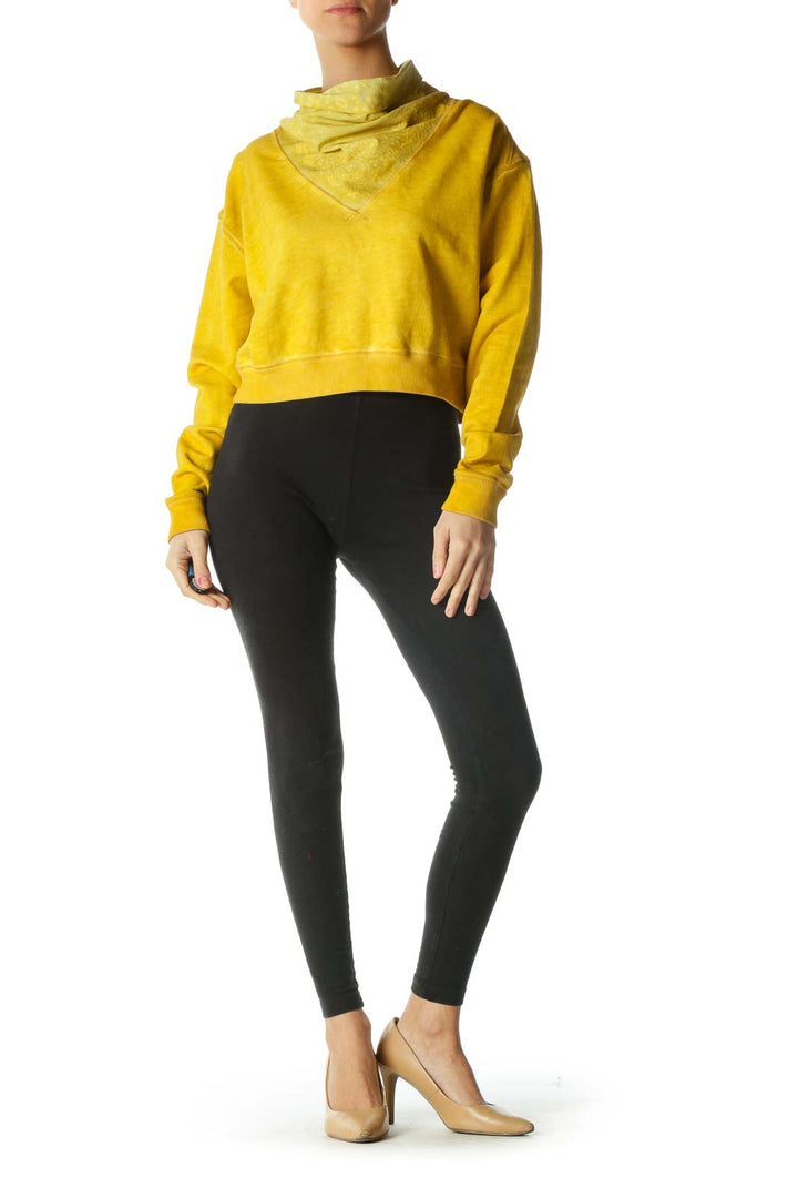 Front view of yellow Free People cropped sweatshirt with cowl neck