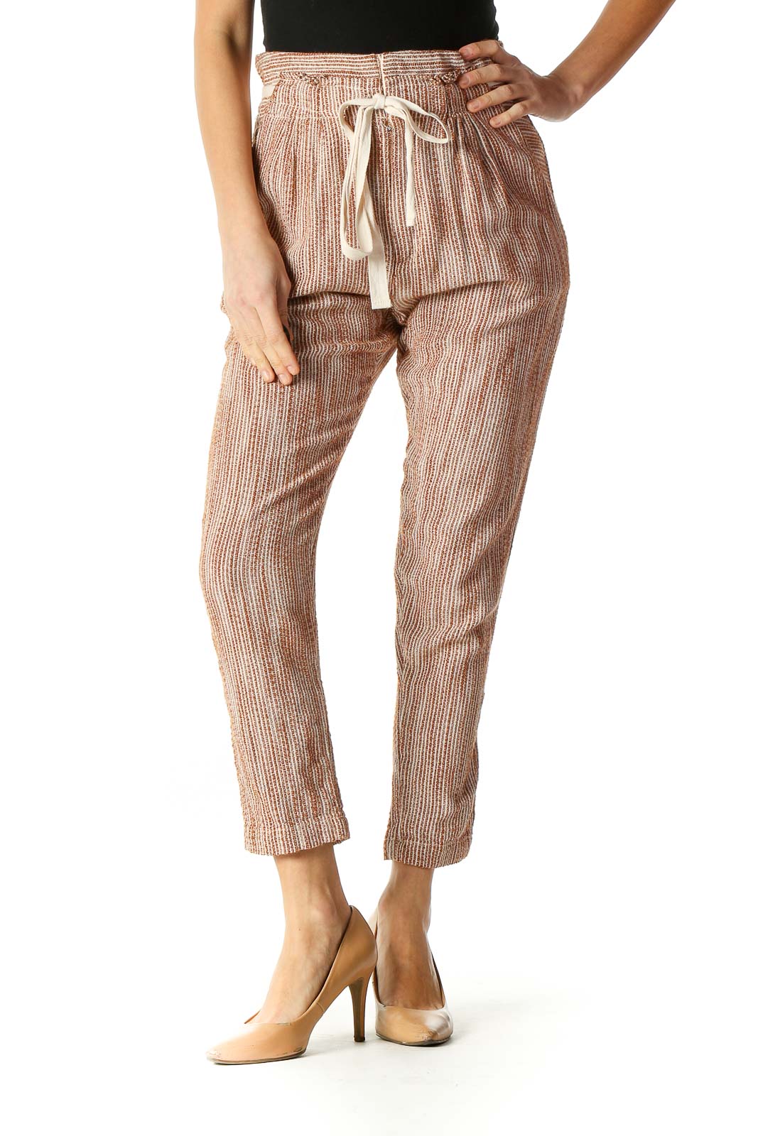 Front view of Free People beige striped drawstring pants on model