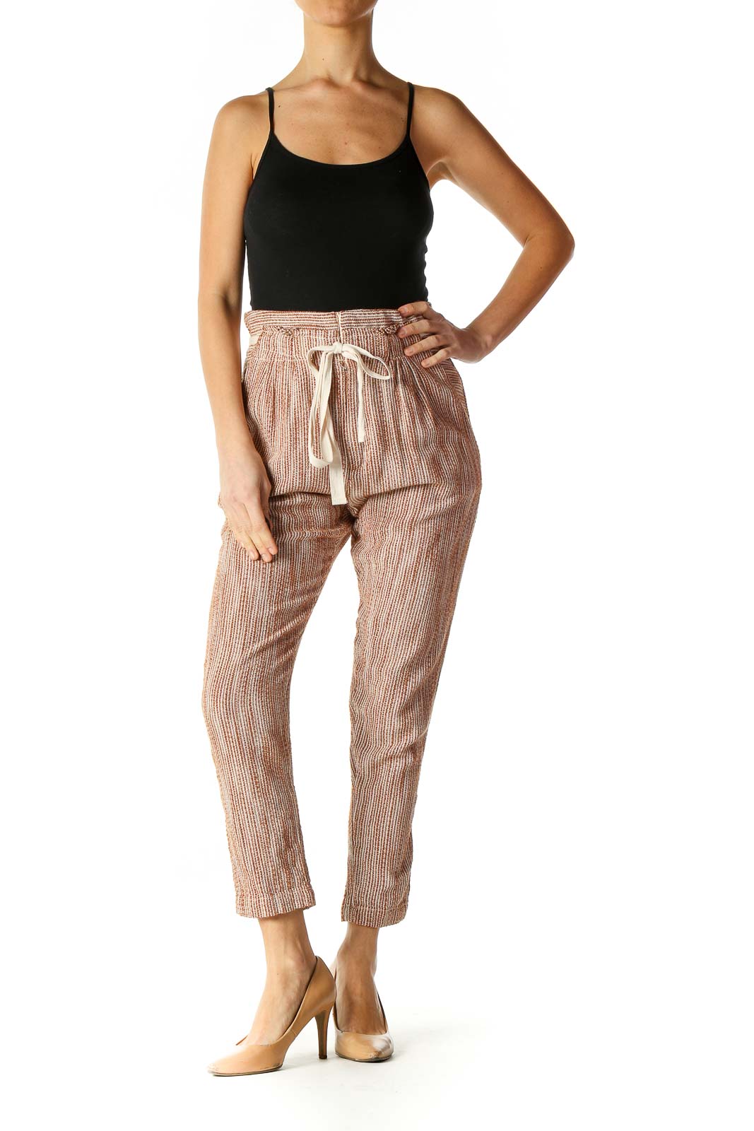 Front view of Free People beige striped drawstring pants on model