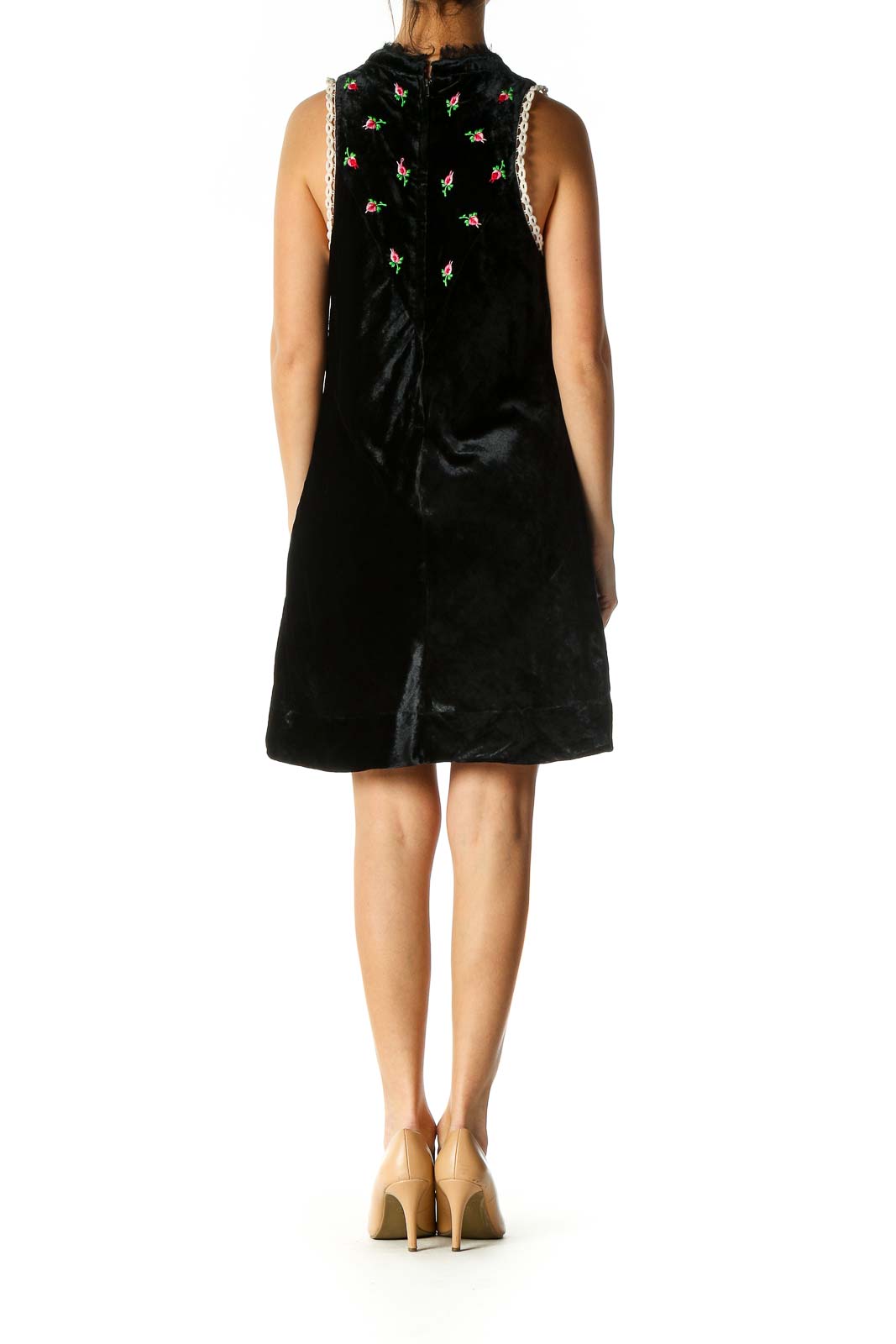 Back view of Free People black velvet mini dress showing A-line silhouette