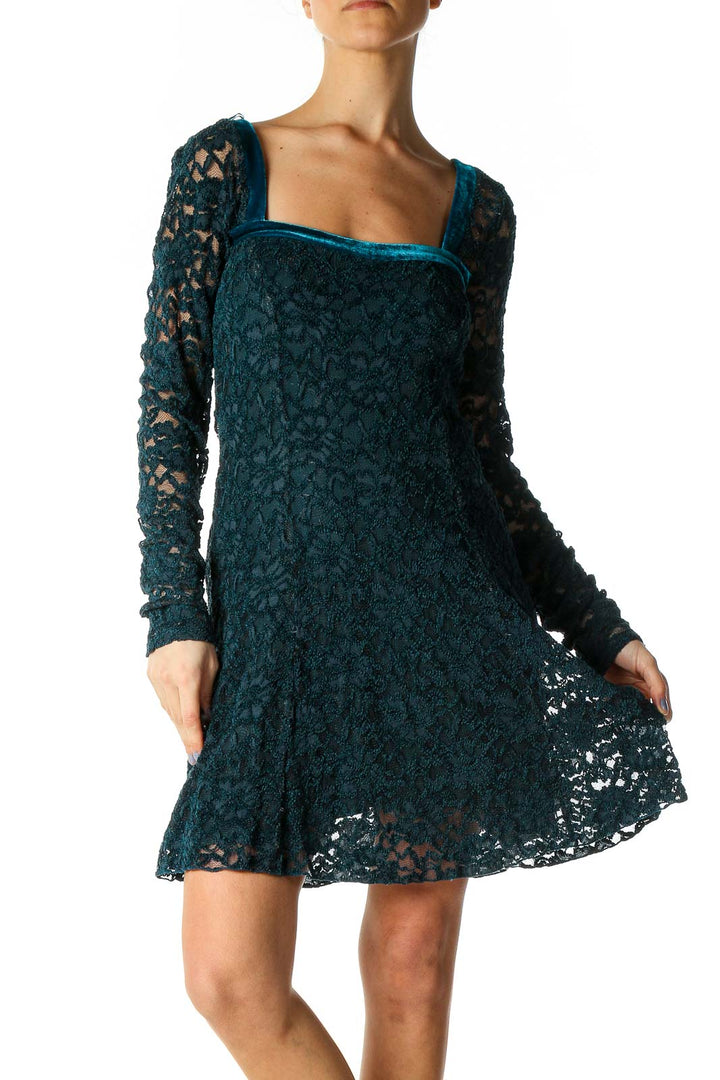 Front view of teal lace long sleeve mini dress by Free People