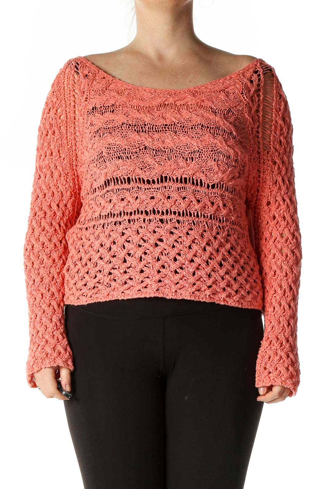 Front view of Free People coral crochet knit crop sweater with intricate open-knit pattern