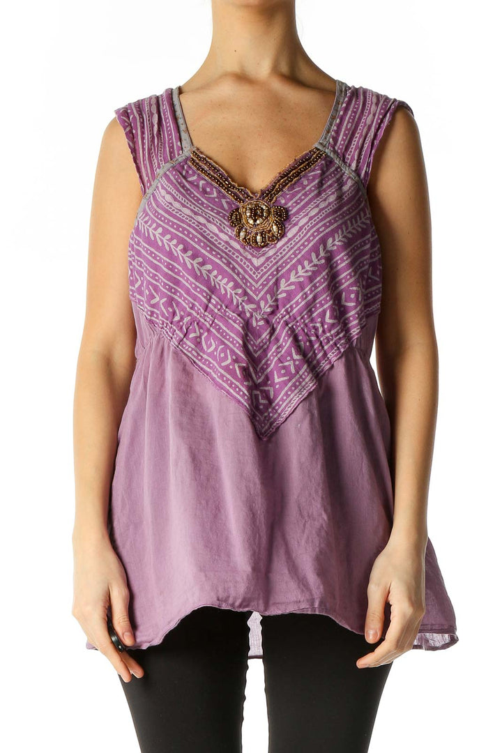 Front view of purple Free People embroidered sleeveless top with beaded V-neckline