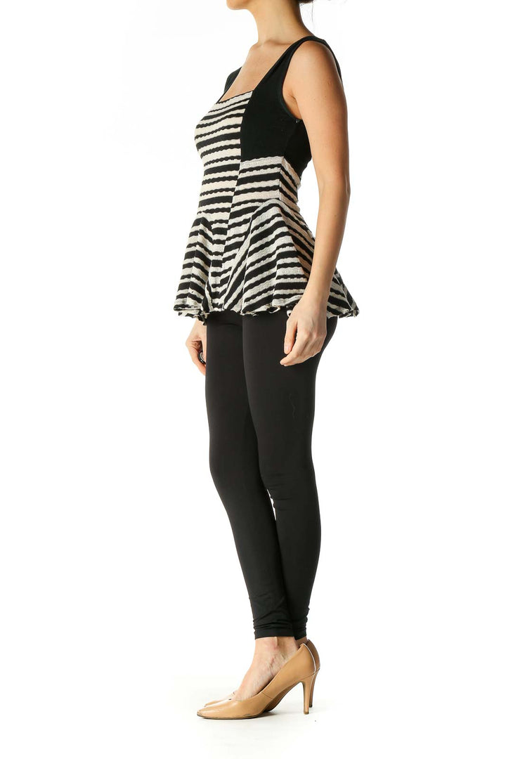 Front view of Free People Black and White Striped Peplum Knit Top with square neckline