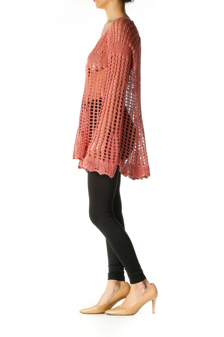 Front view of coral crochet tunic with bell sleeves by Free People