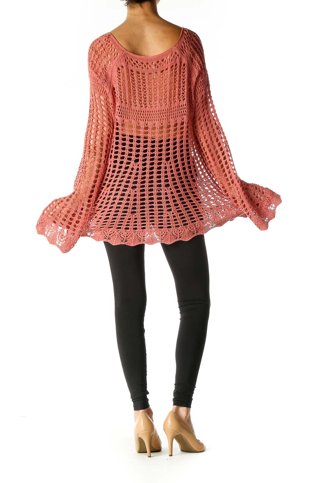 Back view of coral crochet tunic showing open-knit pattern and scalloped hem