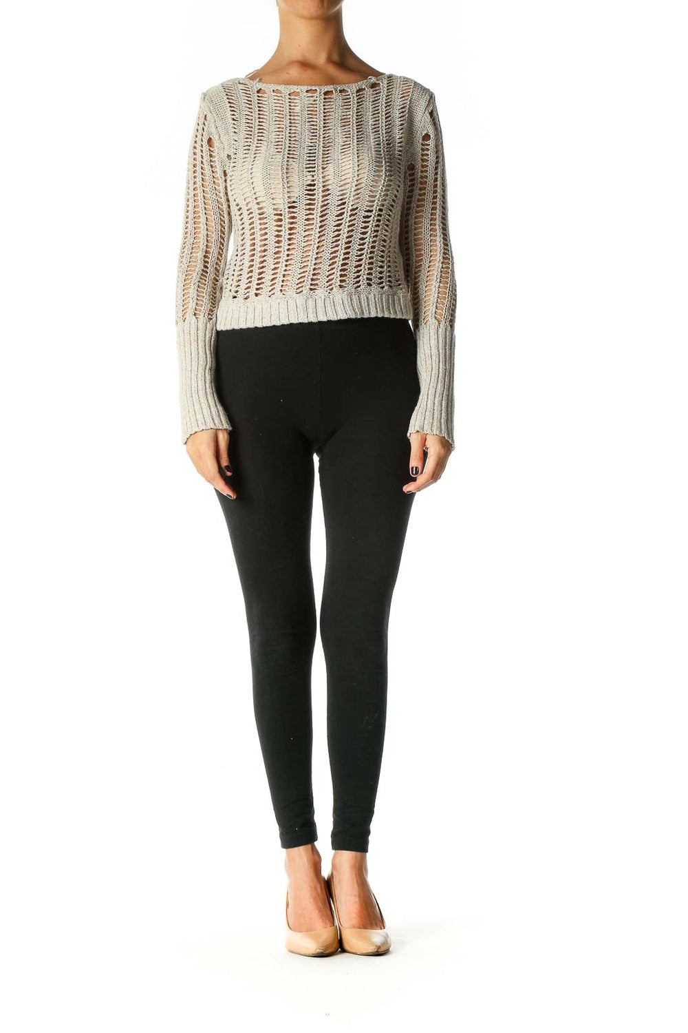 Front view of Free People beige open knit cropped sweater on model