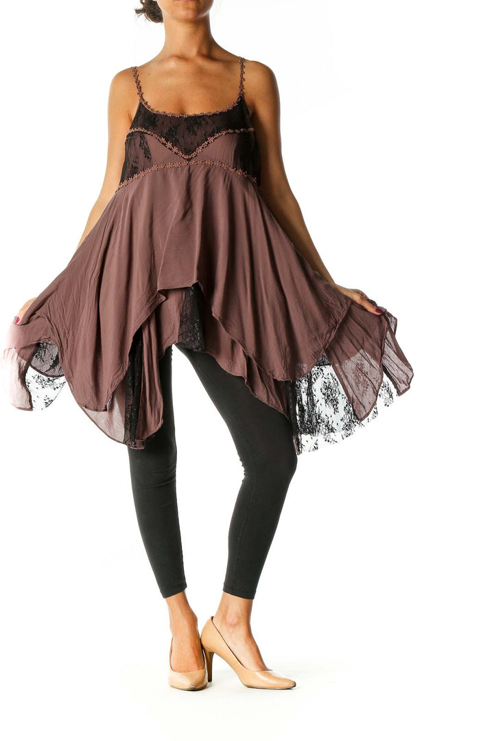 Front view of brown Free People camisole top with lace trim and asymmetrical hem