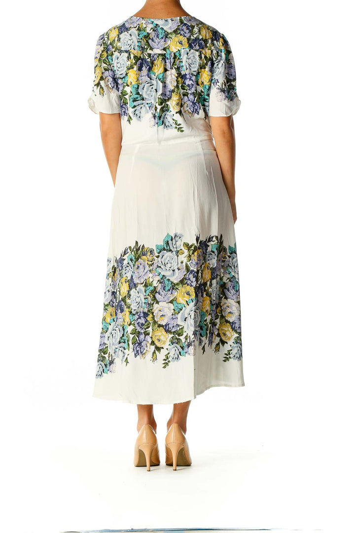 Back view of white floral wrap midi dress from Free People