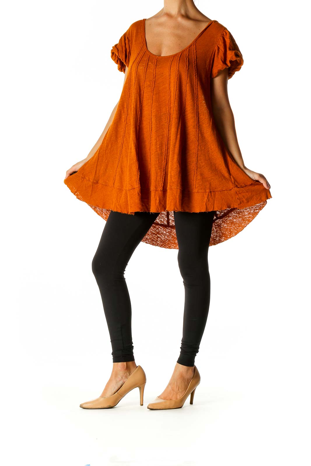 Front view of orange Free People tunic top with scoop neck and flowy silhouette